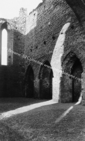 DUNBRODY ABBEY ORGINAL & SUPPORTING ARCHES UNDER TOWER FROM S.CIRCLE